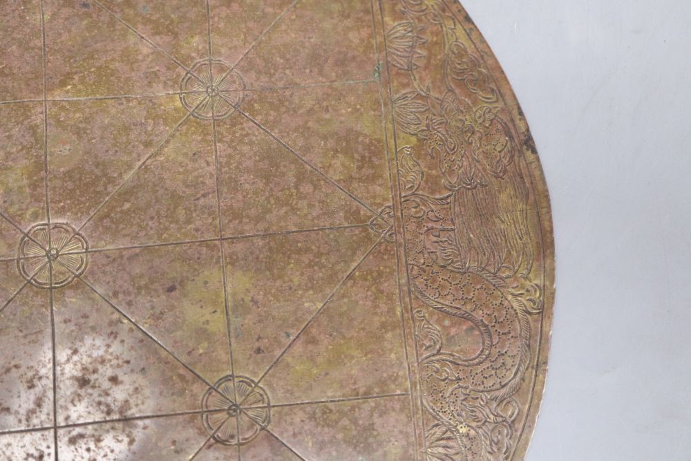 A Chinese 19th century brass games board, diameter 24cm